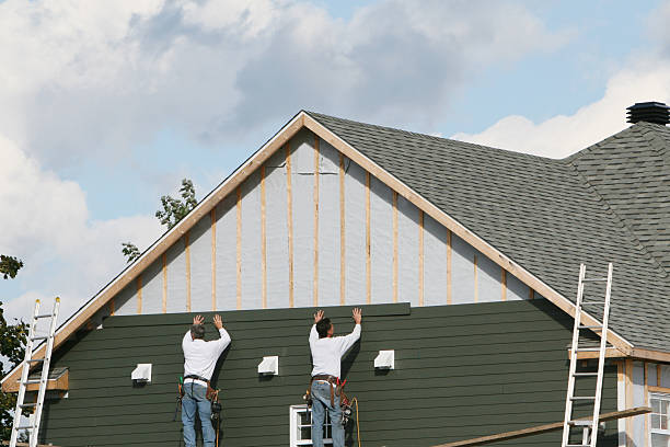 Professional Vinyl Siding technician working in Somerville, MA